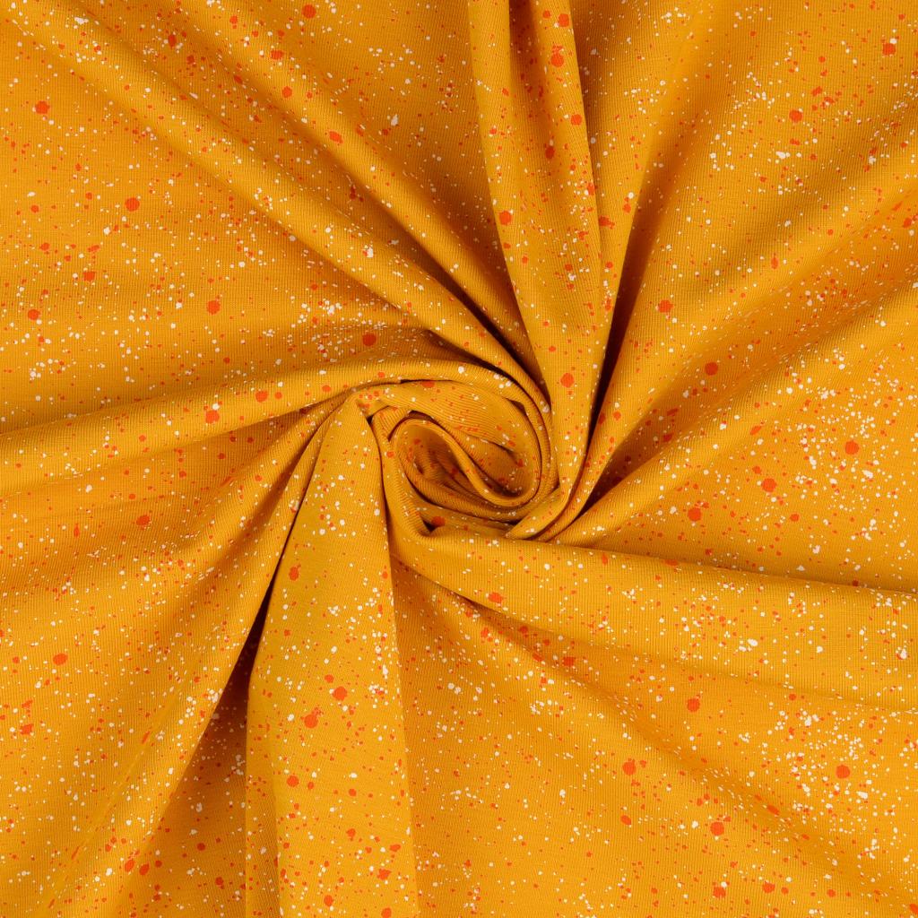 Baumwolljersey in gelb mit Sprenkeln in weiss und orange